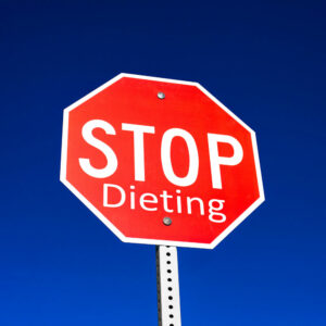 "Stop Dieting" stop sign