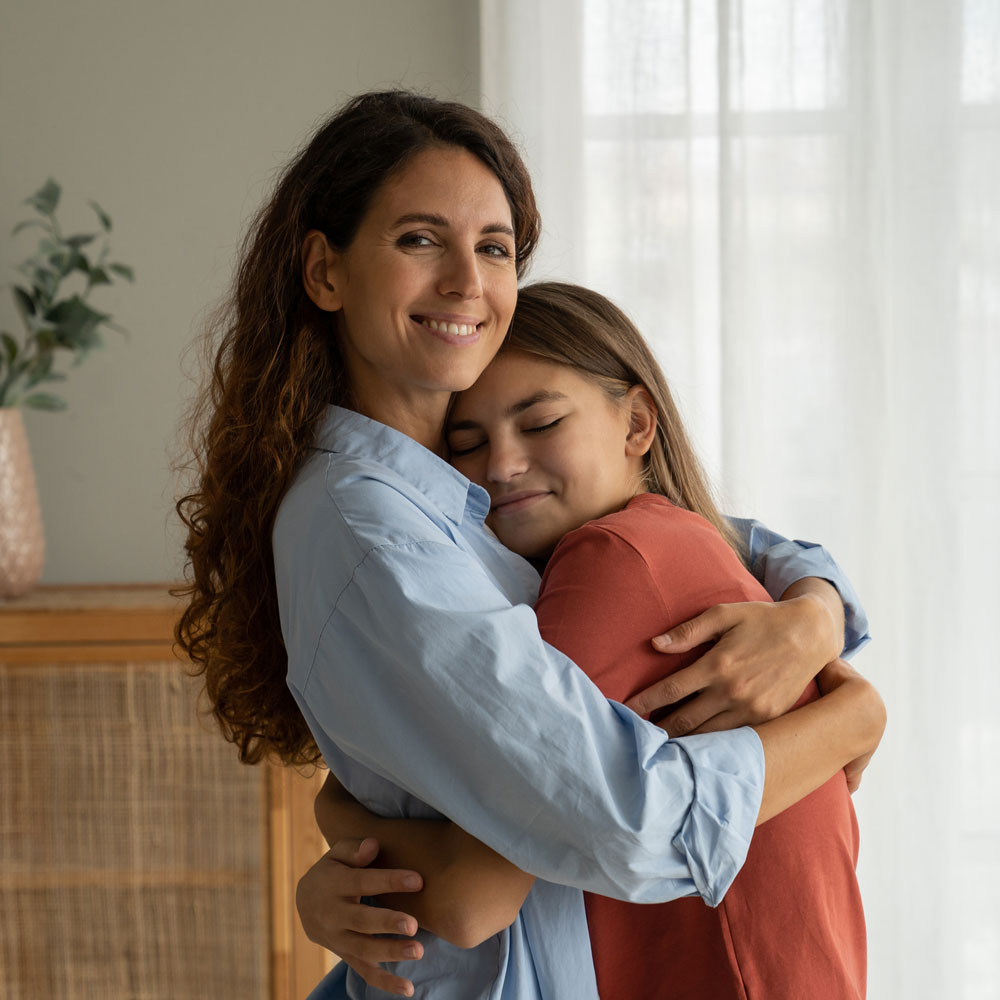 mother and daughter hugging