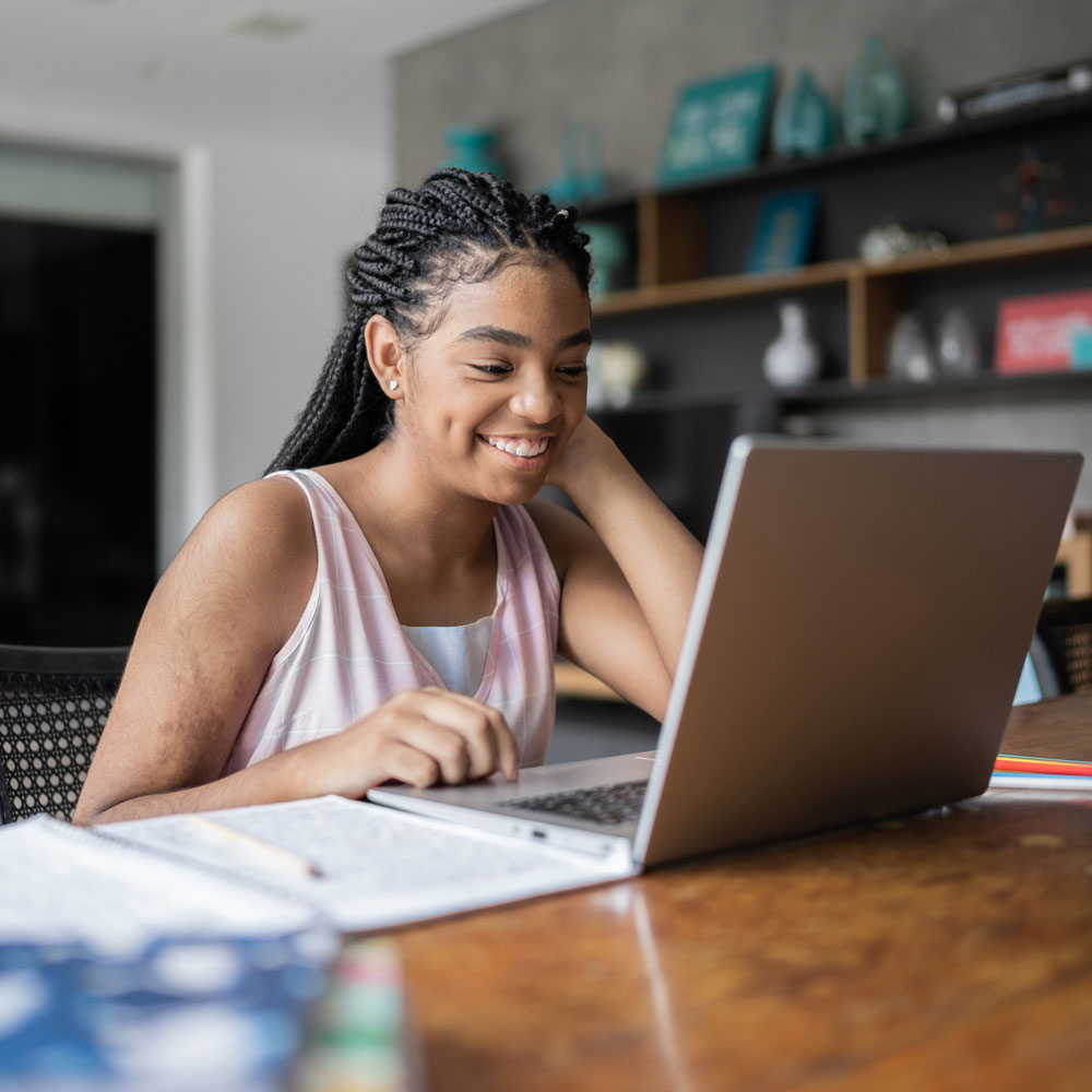 teen girl on laptop