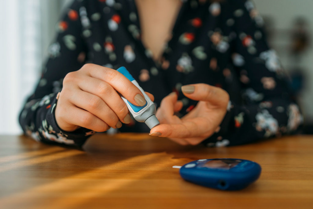 Woman checking insulin